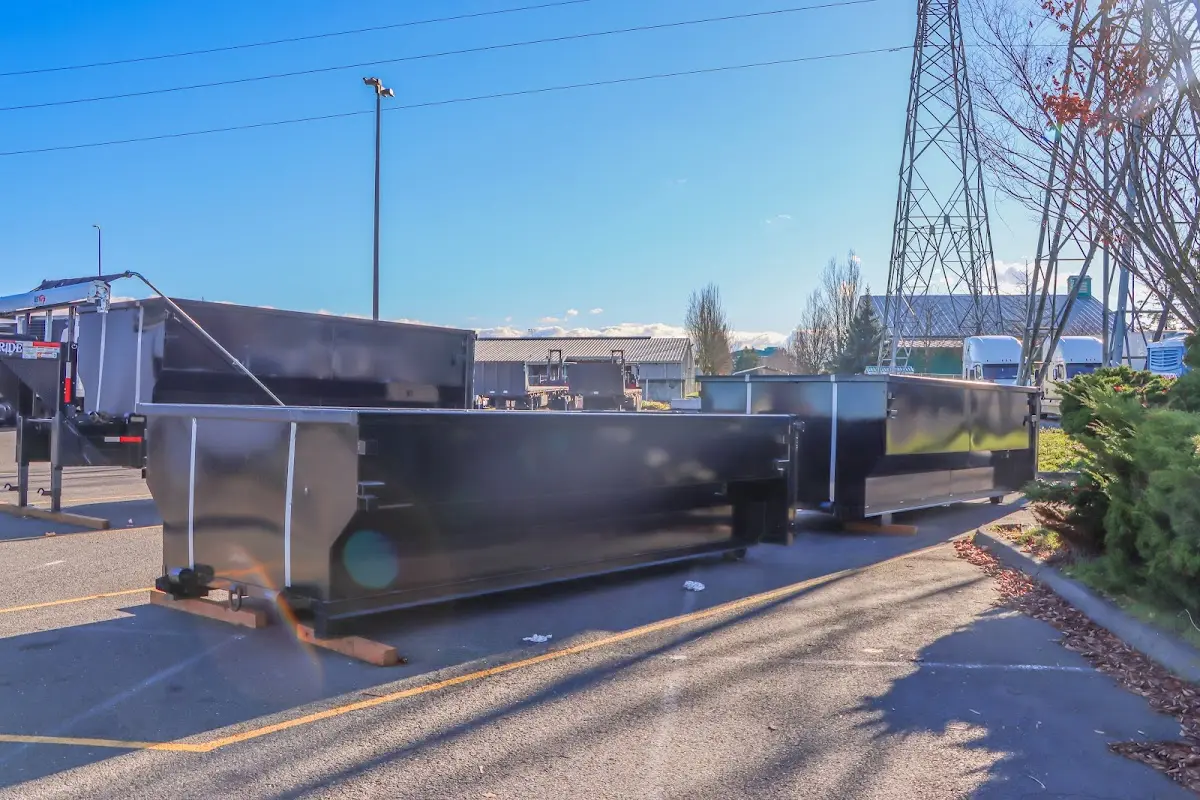 Roll-off dumpster ready for waste disposal at job site for Roofing Dumpster Rental in Silsbee